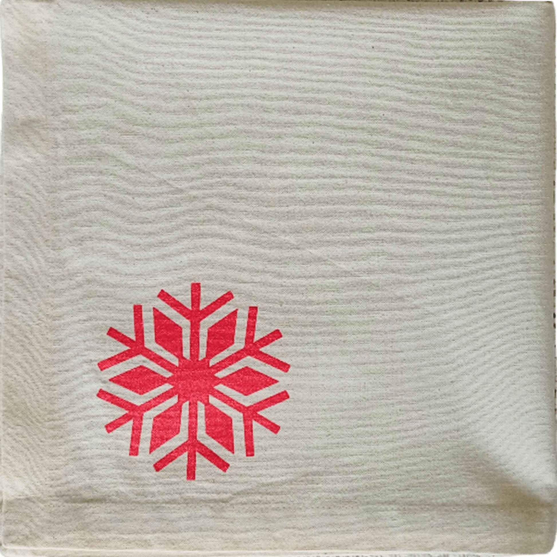 Folded Nordic Snowflake napkin by SeaNic — organic cotton napkin hand-printed in Devon with a Scandi inspired snowflake motif for sustainable Christmas table décor.