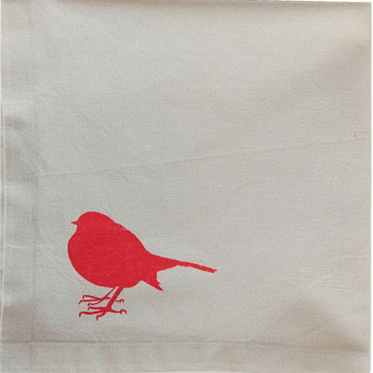 Folded Robin Christmas napkin by SeaNic — organic cotton napkin hand-printed in Devon, showing a bird design ready to style your Christmas table.