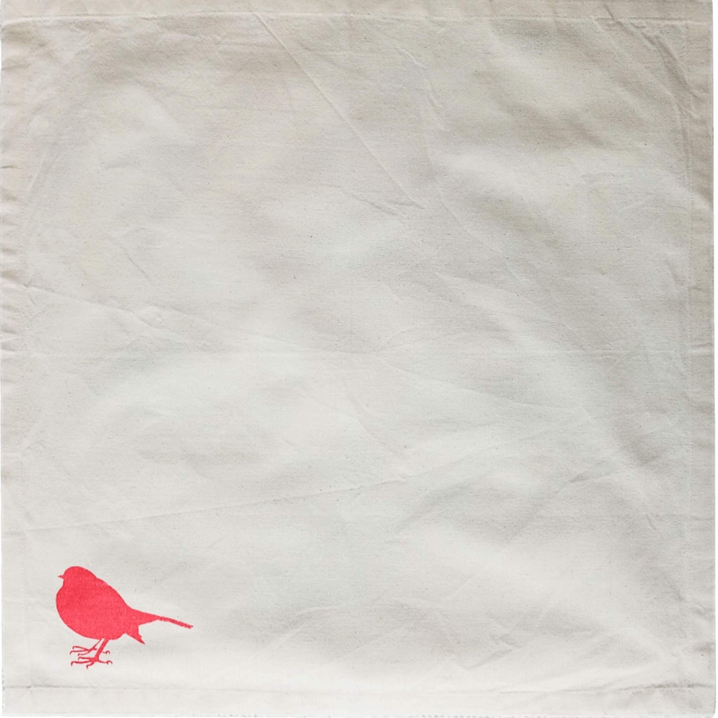 Robin Christmas napkin by SeaNic — organic cotton napkin hand-printed in Devon with a cheerful robin design, ideal for eco-friendly Christmas dining.