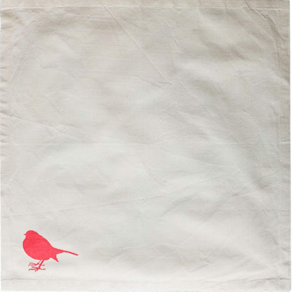 Robin Christmas napkin by SeaNic — organic cotton napkin hand-printed in Devon with a cheerful robin design, ideal for eco-friendly Christmas dining.