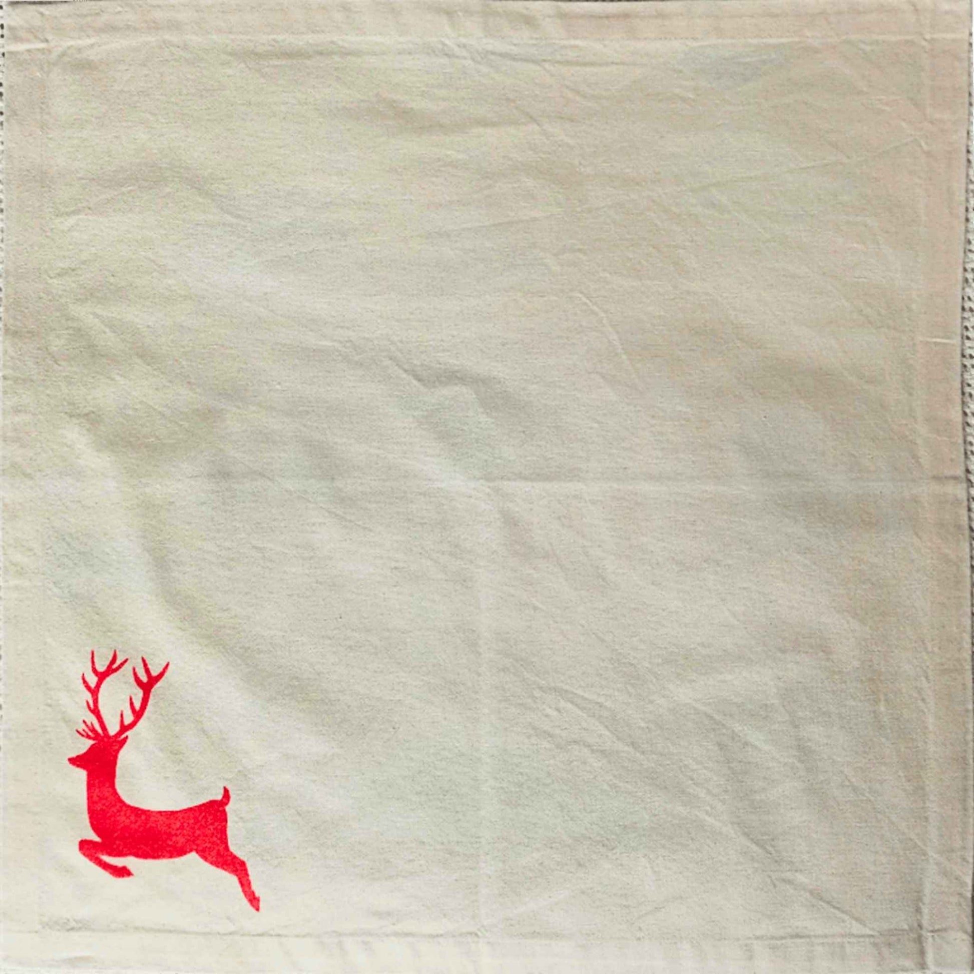 Stag Christmas napkin by SeaNic — organic cotton napkin hand-printed in Devon with a bold stag silhouette, perfect for a sustainable festive table.