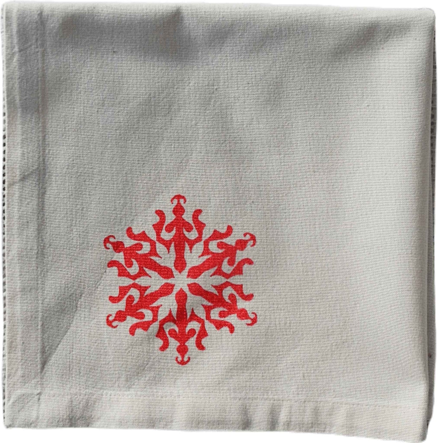 Folded Traditional Snowflake napkin by SeaNic — organic cotton napkin hand-printed in Devon, featuring a classic snowflake print for elegant festive dining.