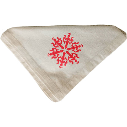 Close-up of the Traditional Snowflake Christmas napkin by SeaNic, showing the crisp hand-printed classic snowflake pattern on natural organic cotton.