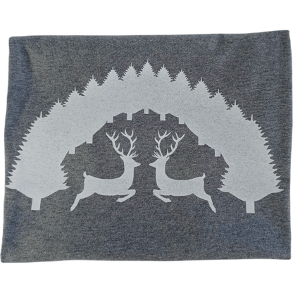 Close-up of a white screen-printed stag and pine tree design on a charcoal grey organic cotton t-shirt by SeaNic. Show the crisp detail acheived by hand screen printing