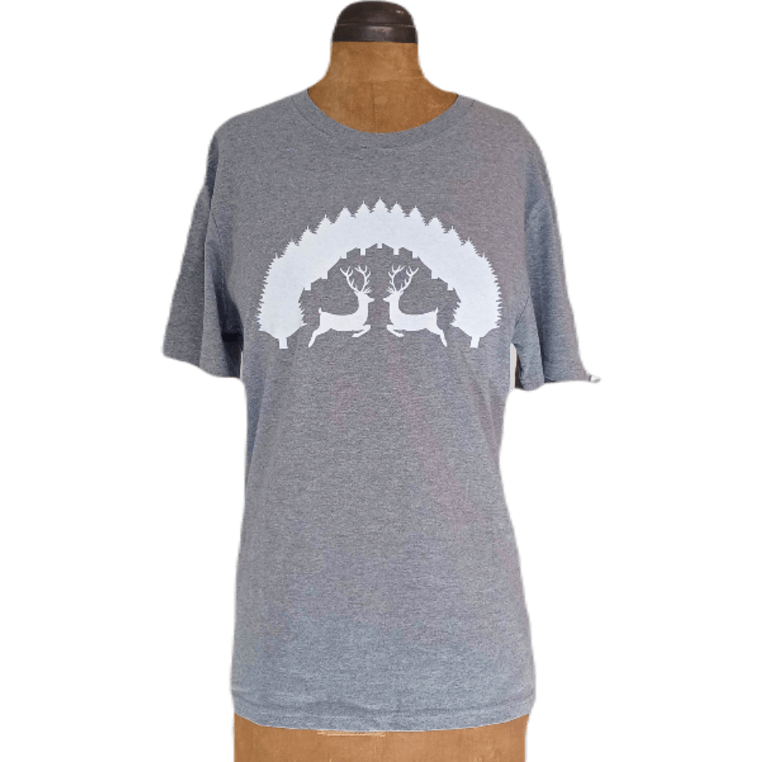 The 'Stags in the Forest' t-shirt shown on a mannequin, highlighting the comfortable, relaxed unisex fit and soft drape of the sustainable organic cotton.