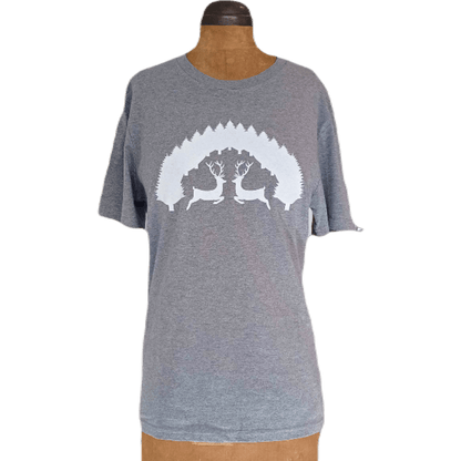 The 'Stags in the Forest' t-shirt shown on a mannequin, highlighting the comfortable, relaxed unisex fit and soft drape of the sustainable organic cotton.