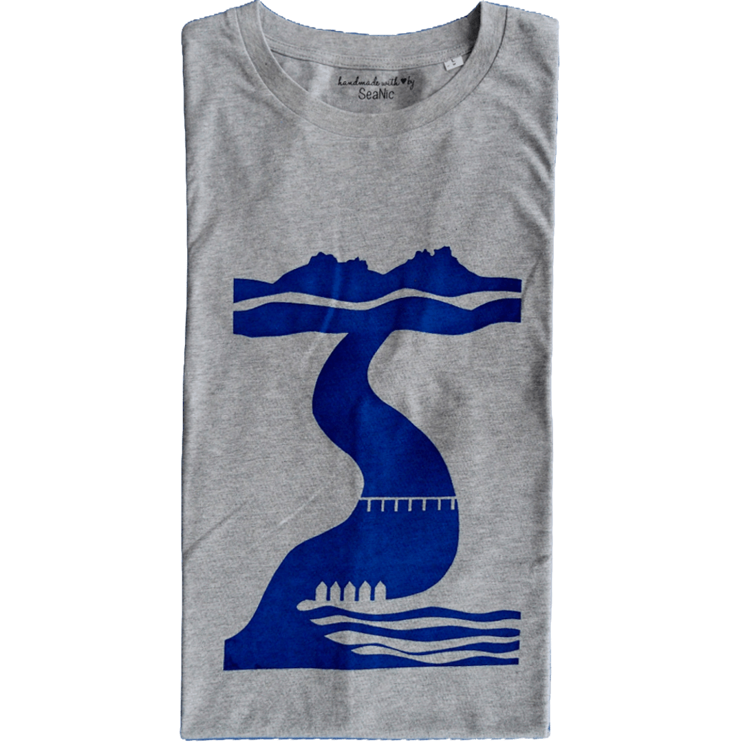 Close-up of the folded Tor to Sea graphic t-shirt, showing the soft texture of the grey organic cotton and the crisp, hand-printed navy blue ink detail of the Dartmoor-inspired design.