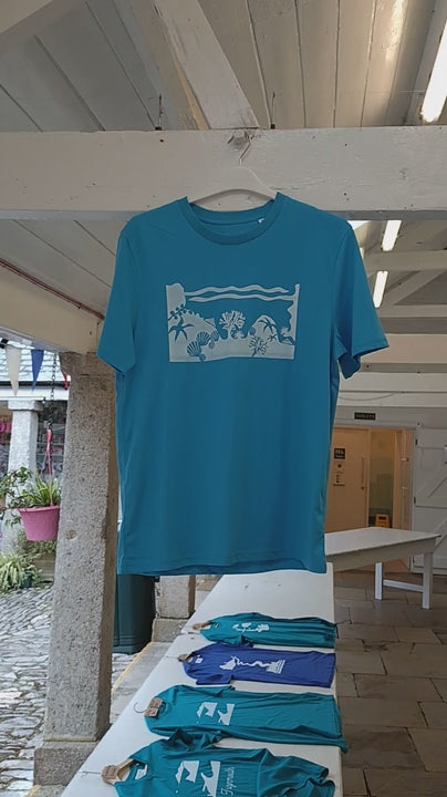 Short video of the Aqua Blue Rockpool t-shirt by SeaNic hanging on a hanger and fluttering gently in the breeze at Dartmouth Market, showing its hand-printed coastal rockpool design.